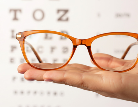 Prescription glasses or prisms to correct double vision